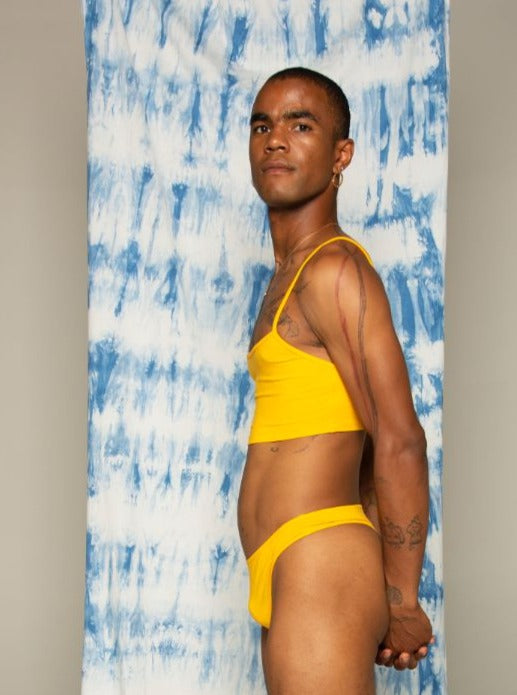Side of kowhai yellow koha crop top. Bamboo underwear. Bare boutique