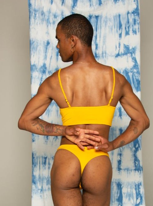 Back of kowhai yellow koha crop top. Bamboo underwear. Bare boutique