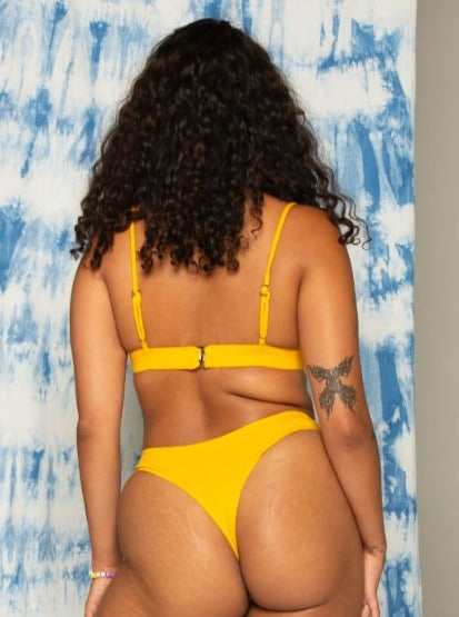 Back of kowhai yellow awhi bralette. Bamboo underwear. Bare boutique